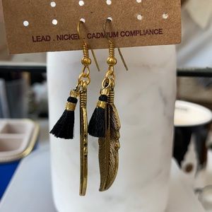 Gold feather earring from Bali